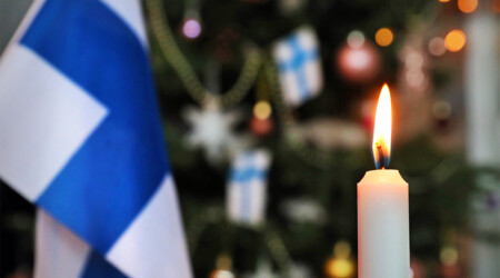 Suomen lippu ja kynttilä